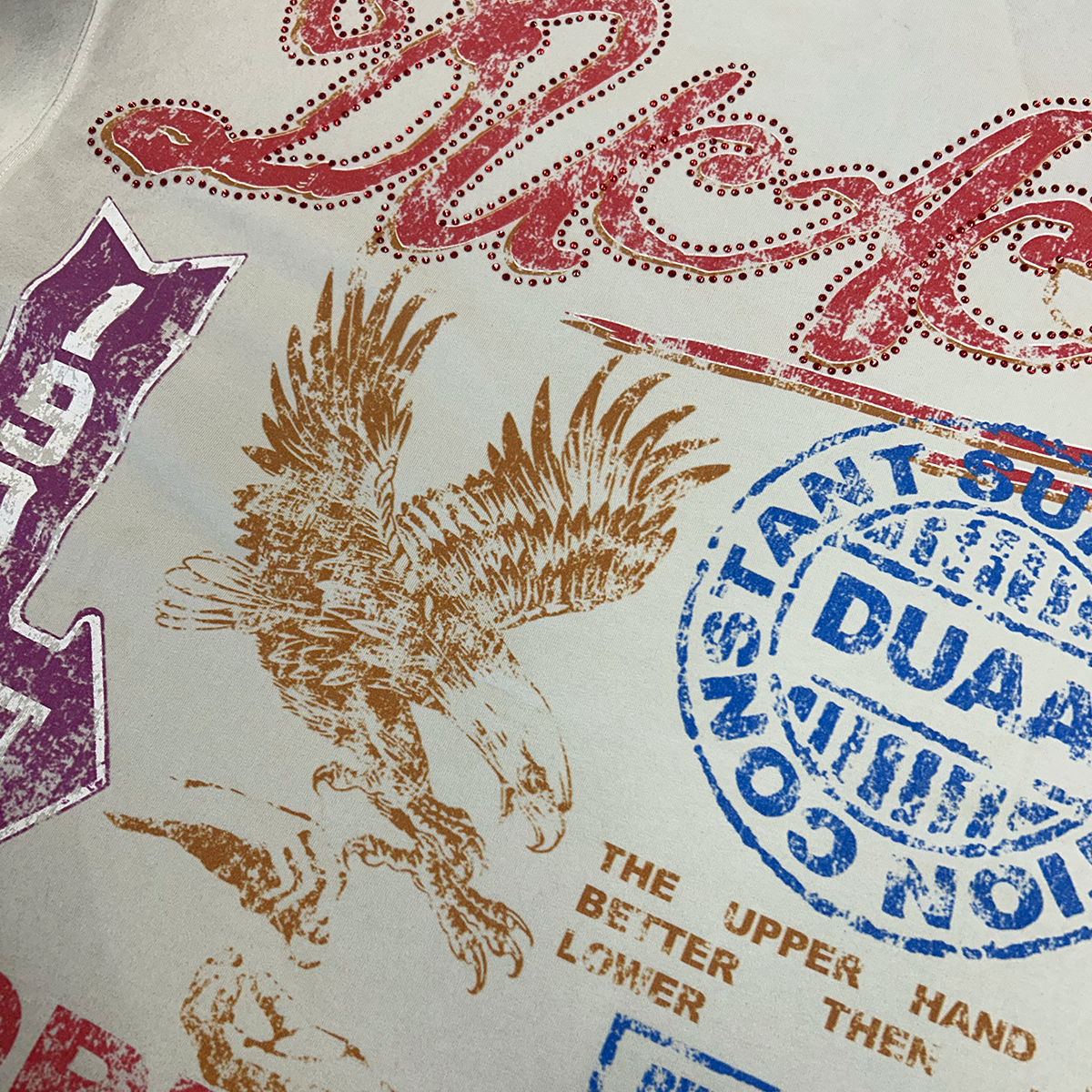 duaa-upper-hand-rhinestone-tee-dirty-white-6-rings-clothing